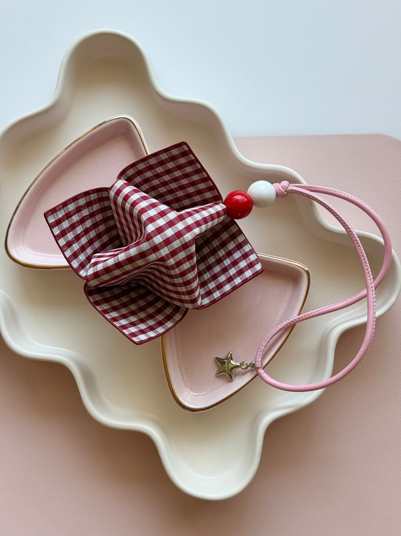 Pink fortune teller bag charm