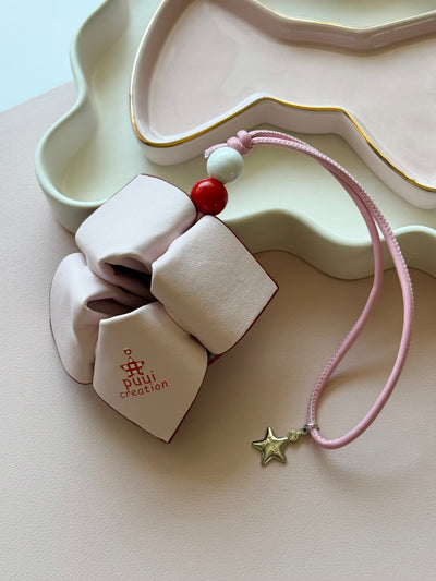 Pink fortune teller bag charm